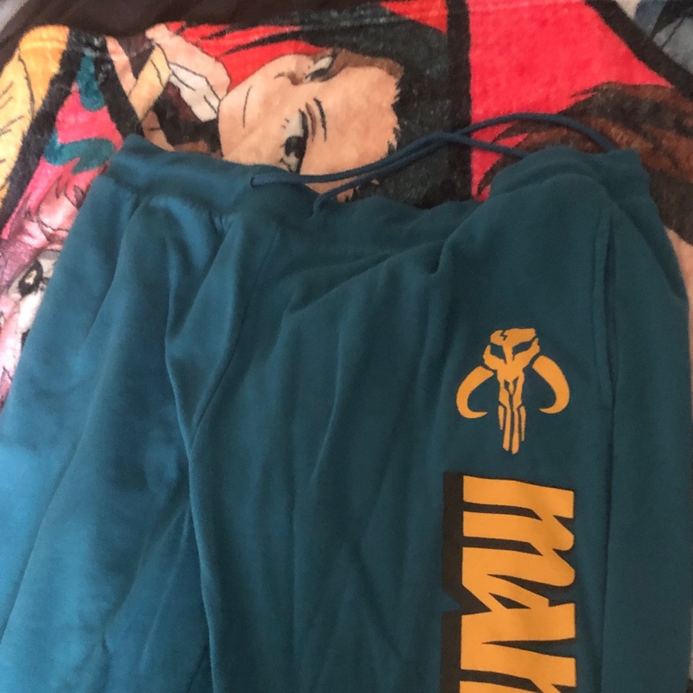 Teal Sweatpants with Yellow Mandalorian Mythosaur Graphic